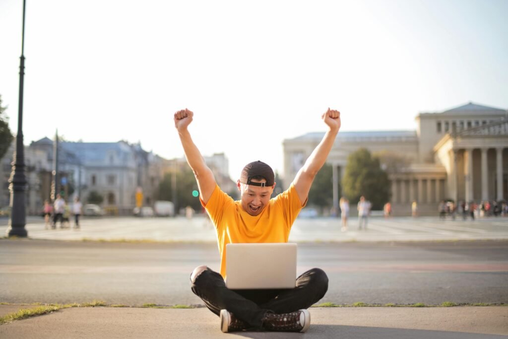 Successful learner celebrating achievement after mastering new skills